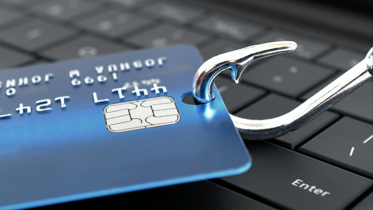 Photo of a credit card hanging on a fishing hook