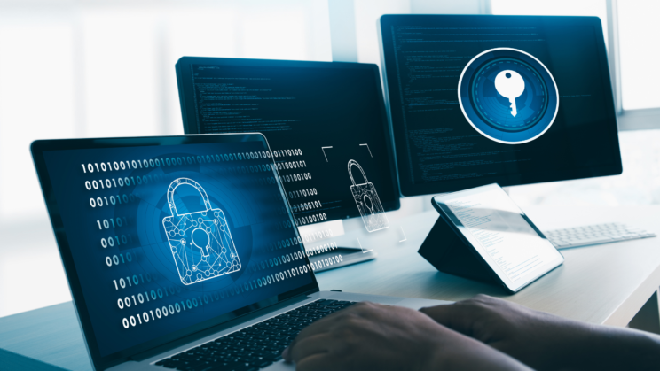 Collaboration security: Laptop and desktop with blue lock icon